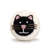Wool dryer ball with a black cat face design on a white background
